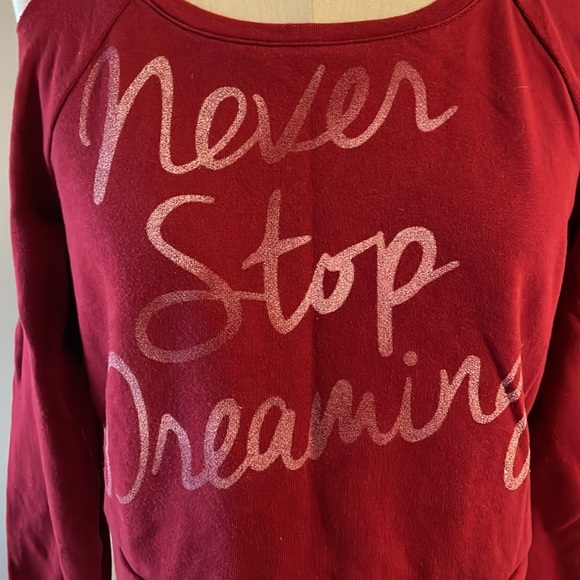 ‘Never Stop Dreaming’ crop cold shoulder light sweatshirt raw edges burgundy Med - Picture 3 of 11